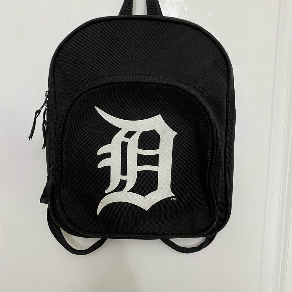 Blue and White Backpack with Gothic Letter Design